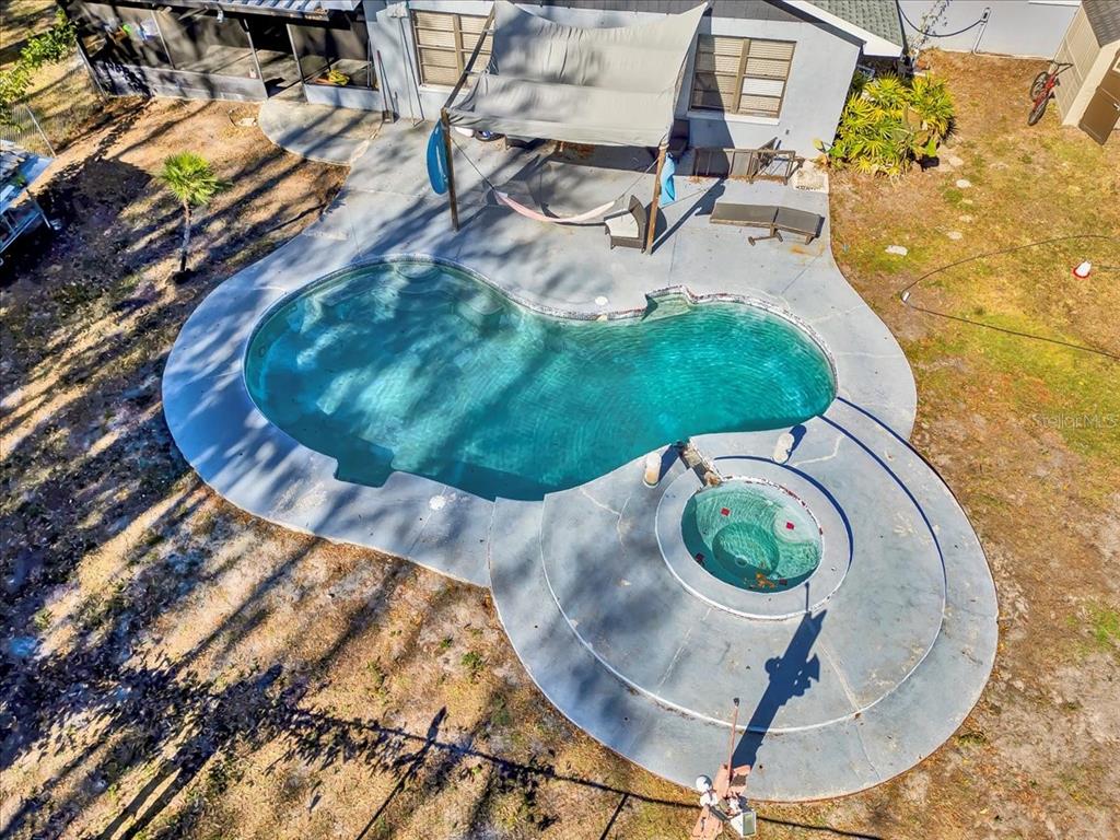 6124 Lynn Road Tampa, FL 33625 - Photo 22 of 84 an aerial view of a house with garden space and sitting space