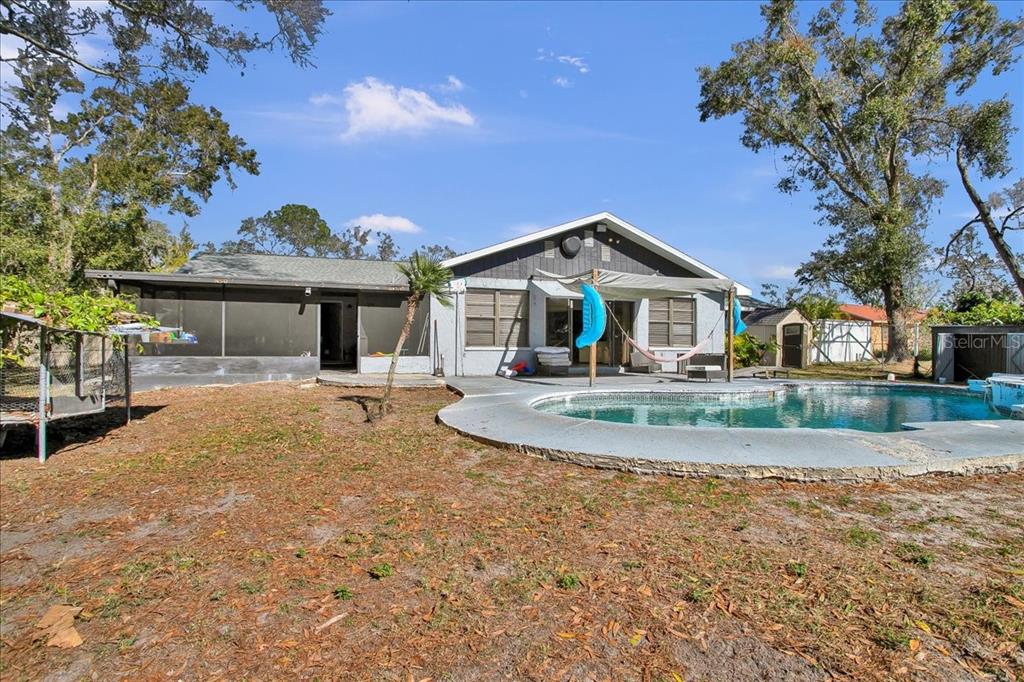 6124 Lynn Road Tampa, FL 33625 - Photo 24 of 84 a front view of a house with a porch