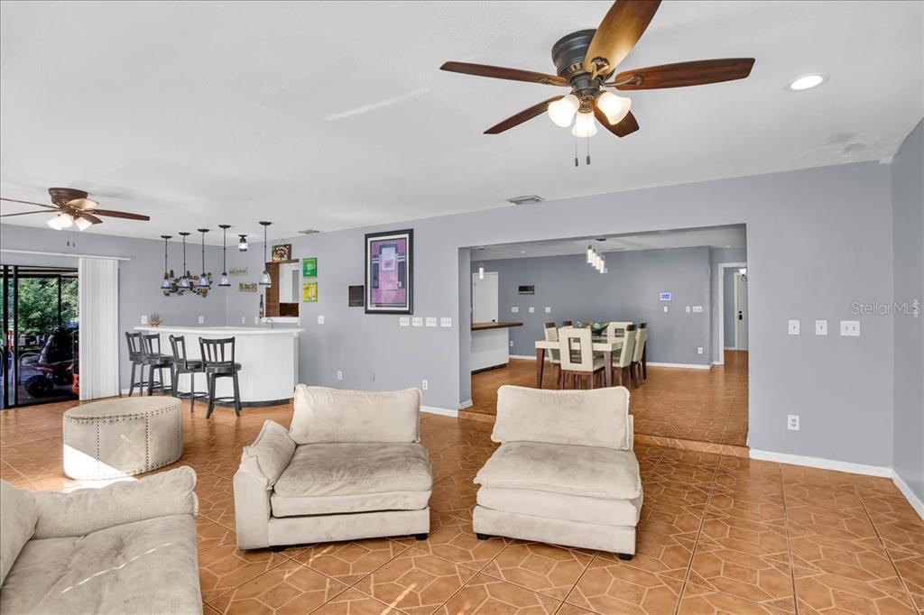 6124 Lynn Road Tampa, FL 33625 - Photo 49 of 84 a living room with furniture and white walls