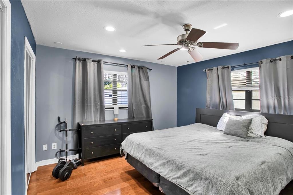 6124 Lynn Road Tampa, FL 33625 - Photo 56 of 84 a bedroom with a bed dresser and a window