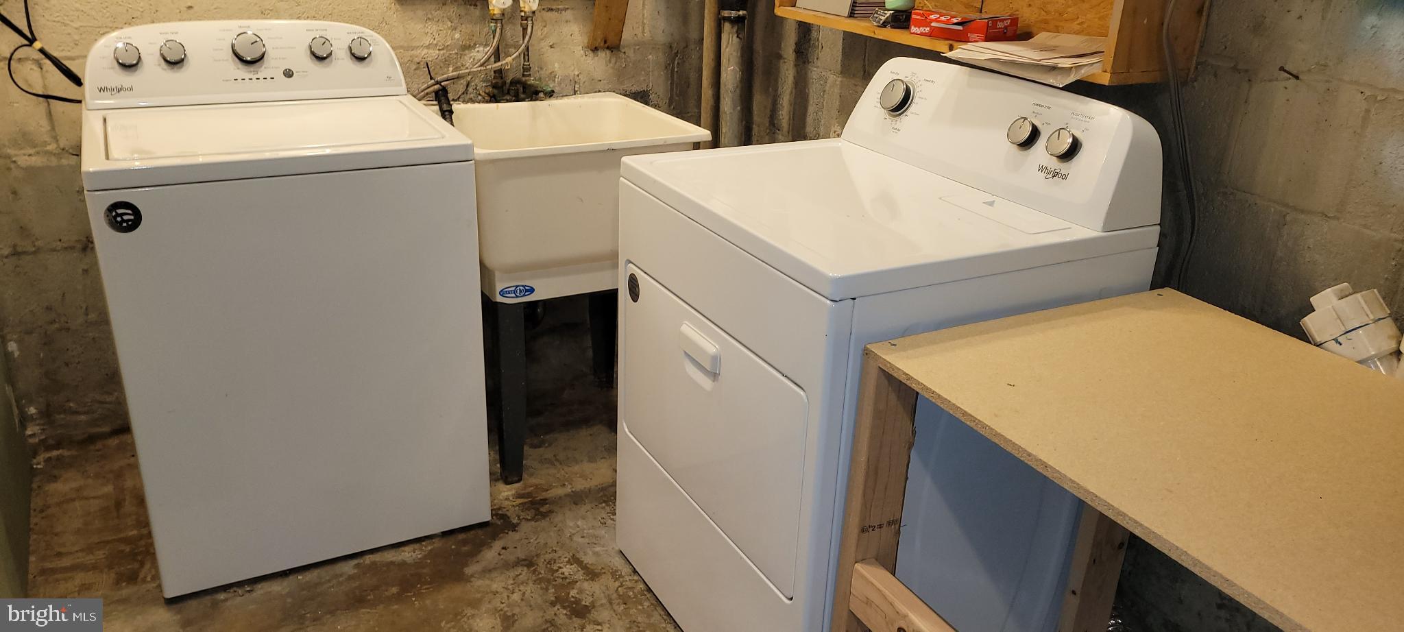 744 Hilltop Terrace Southeast Washington, DC 20019 - Photo 12 of 30 a utility room with dryer and washer