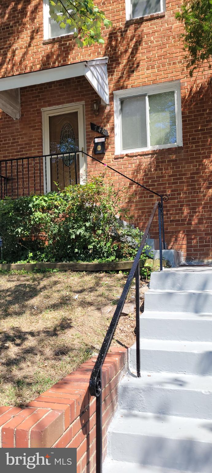 744 Hilltop Terrace Southeast Washington, DC 20019 - Photo 2 of 30 a view of a house with a yard