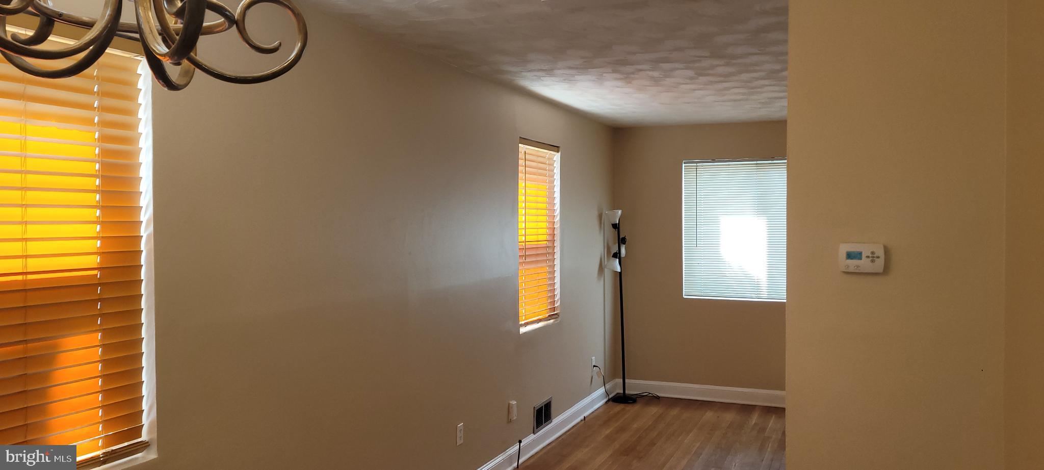 744 Hilltop Terrace Southeast Washington, DC 20019 - Photo 21 of 30 a view of a room with window and wooden floor