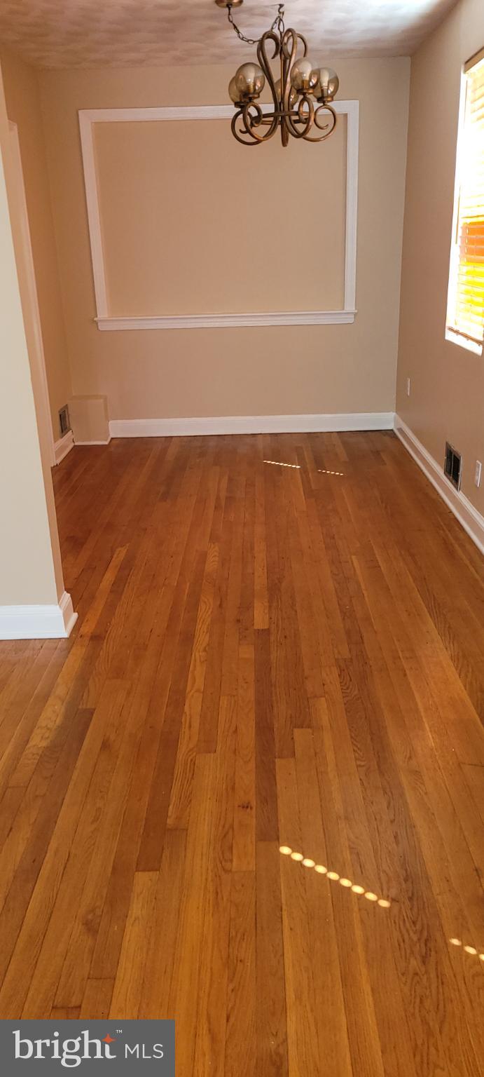 744 Hilltop Terrace Southeast Washington, DC 20019 - Photo 9 of 30 a view of a small space with wooden floor