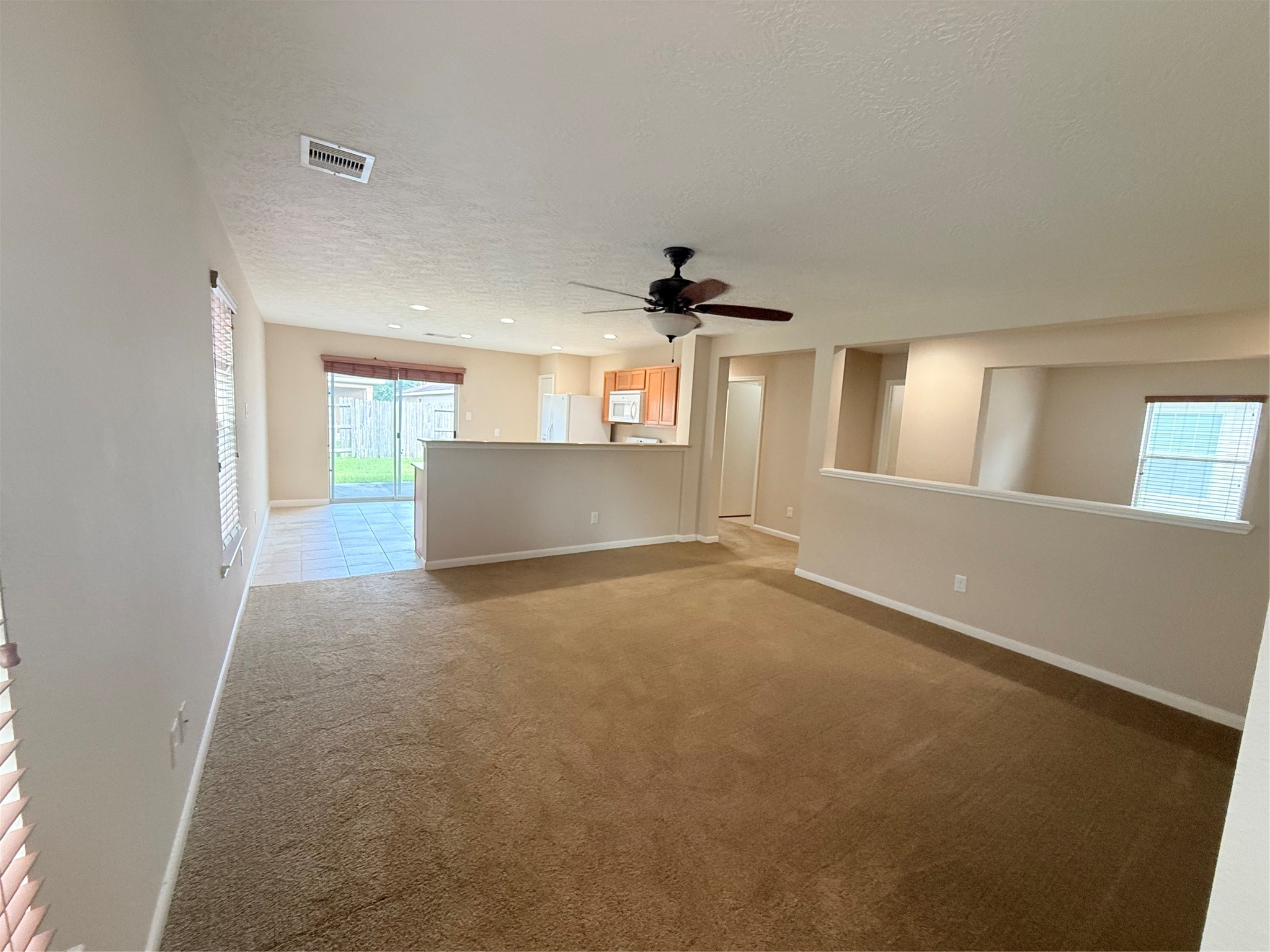 29225 Legends Valley Drive Spring, TX 77386 - Photo 6 of 30 29225 LEGENDS VALLEY DR - Living Room adjacent to Kitchen/Dining Combo