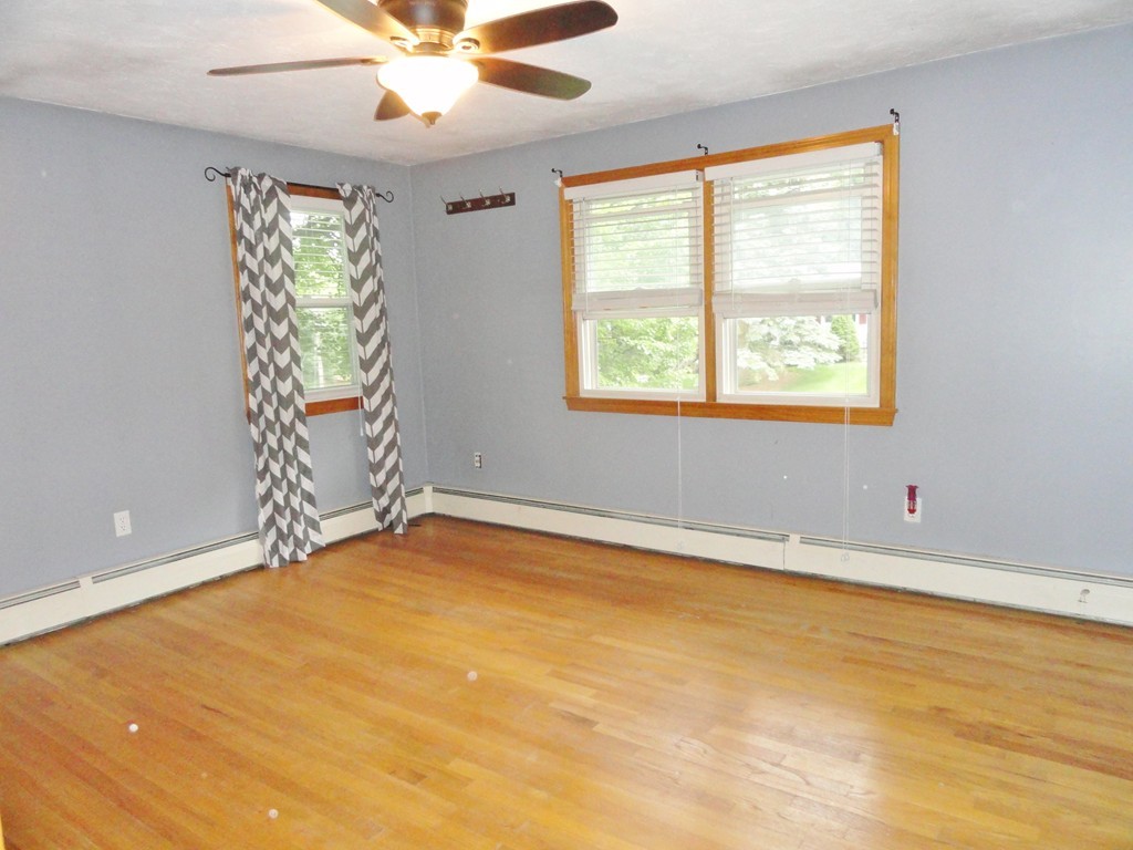 9 Edith Lane Rutland, MA 01543 - Photo 7 of 19 a view of an empty room with a window