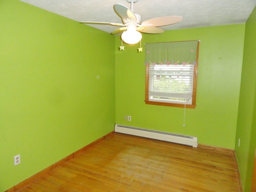 9 Edith Lane Rutland, MA 01543 - Photo 9 of 19 a view of a room with a fan and a window