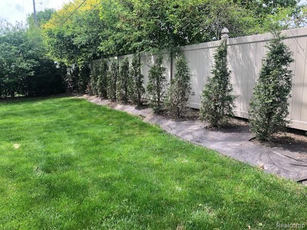 1740 Nantucket Road Plymouth, MI 48170 - Photo 24 of 24 Newer privacy fence with landscaping