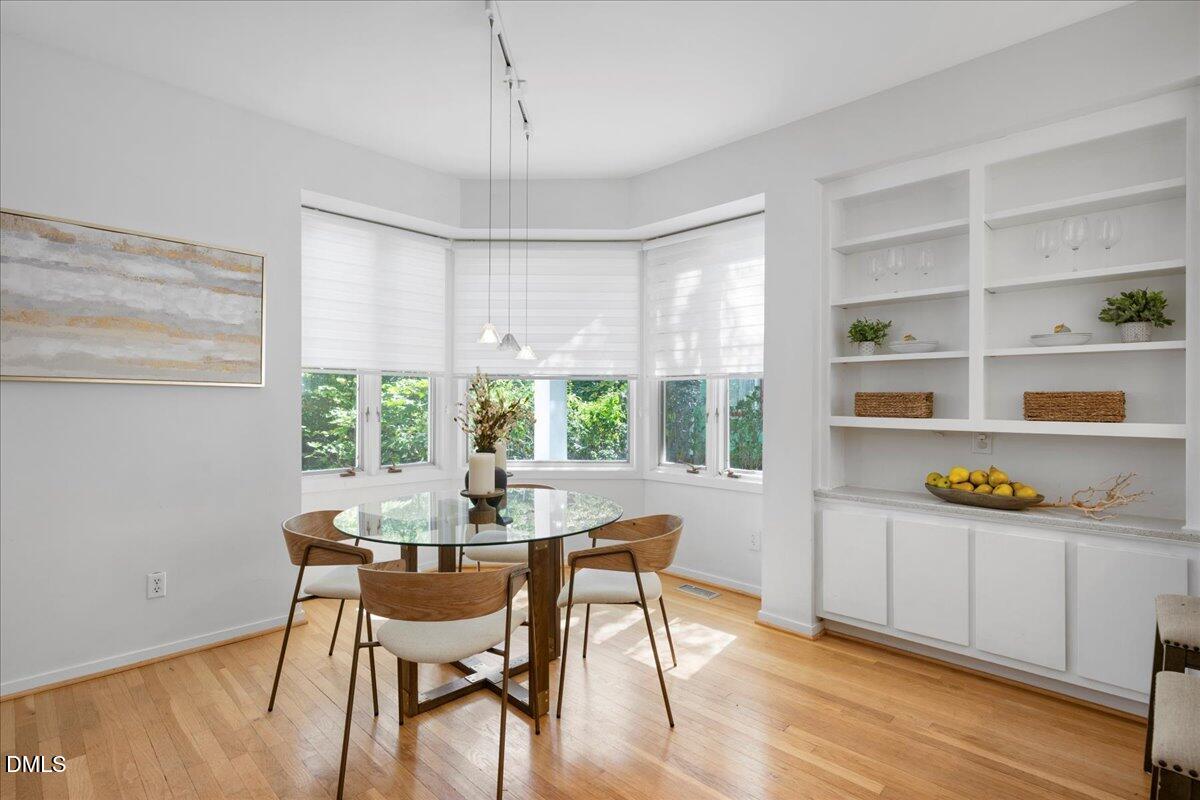 530 Elm Street Raleigh, NC 27604 - Photo 14 of 47 a dining room with furniture and window