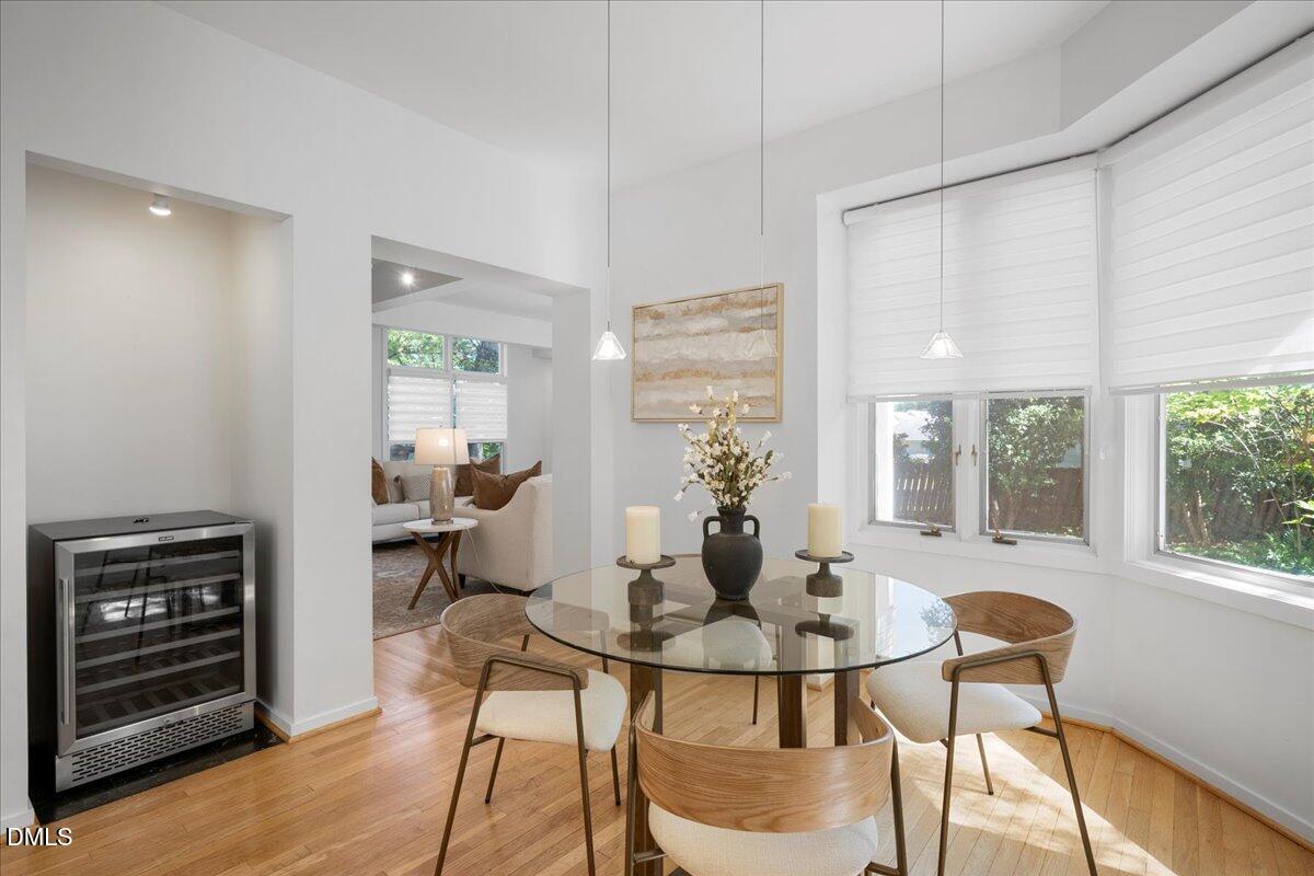 530 Elm Street Raleigh, NC 27604 - Photo 16 of 47 a dining room with furniture and wooden floor