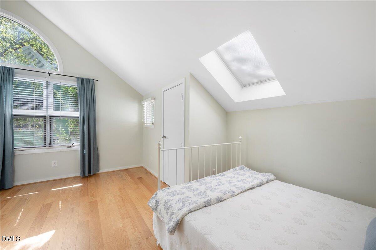 530 Elm Street Raleigh, NC 27604 - Photo 31 of 47 a bedroom with a bed and a window