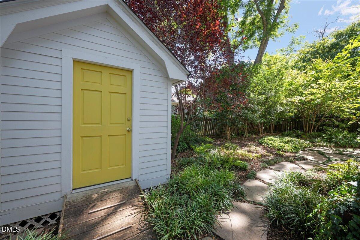 530 Elm Street Raleigh, NC 27604 - Photo 41 of 47 a view of a house with a small yard