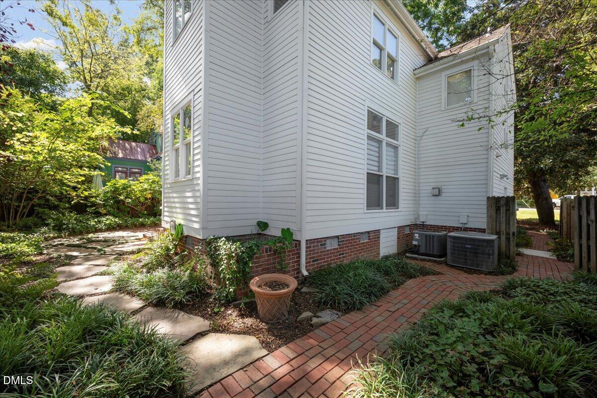 530 Elm Street Raleigh, NC 27604 - Photo 42 of 47 a view of a backyard with potted plants