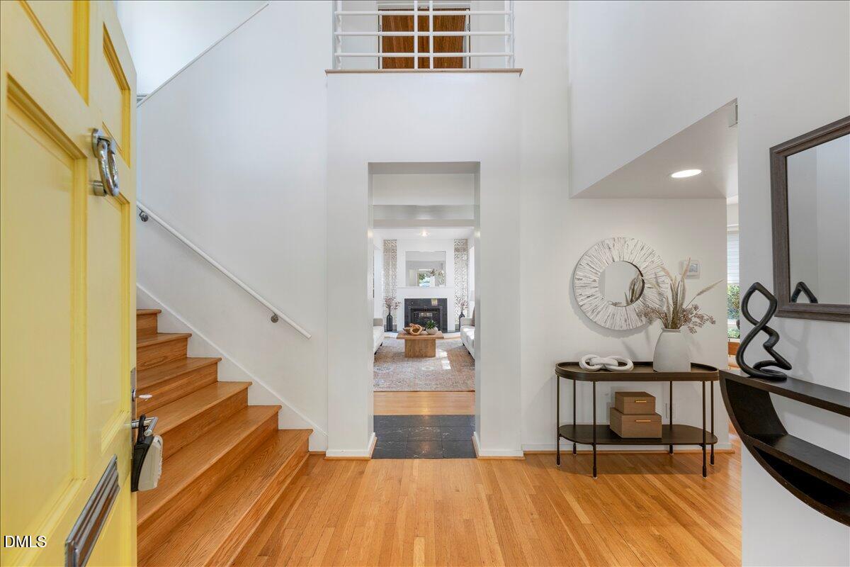 530 Elm Street Raleigh, NC 27604 - Photo 4 of 47 a view of a hallway with wooden floor and a sink