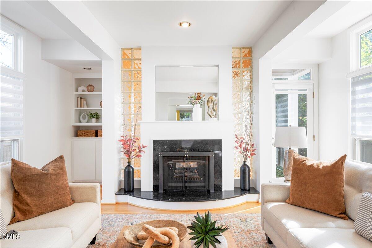 530 Elm Street Raleigh, NC 27604 - Photo 7 of 47 a living room with furniture and a fireplace