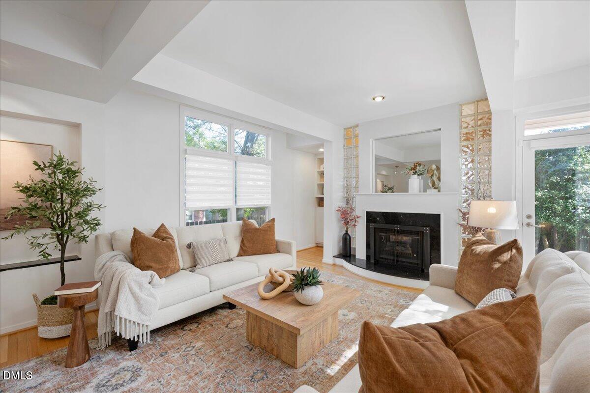 530 Elm Street Raleigh, NC 27604 - Photo 8 of 47 a living room with furniture and a fireplace