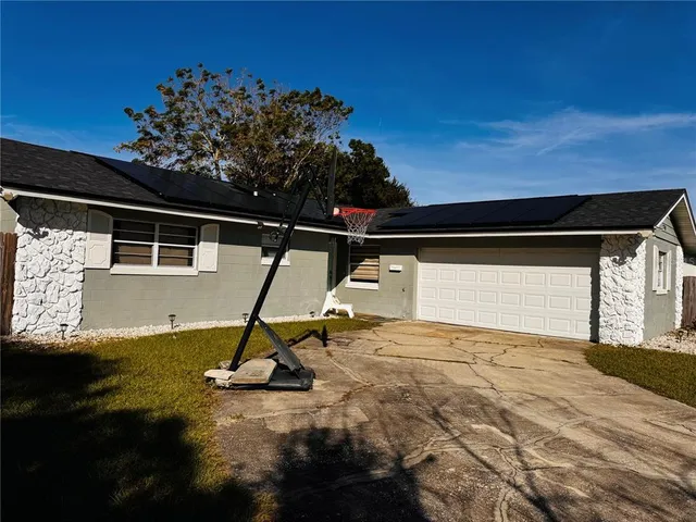a view of a house with a park