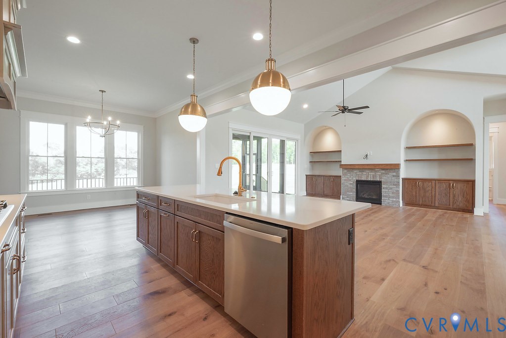 3530 Old Gun Road West Midlothian, VA 23113 - Photo 12 of 50 a large kitchen with stainless steel appliances a large center island attached withe living room