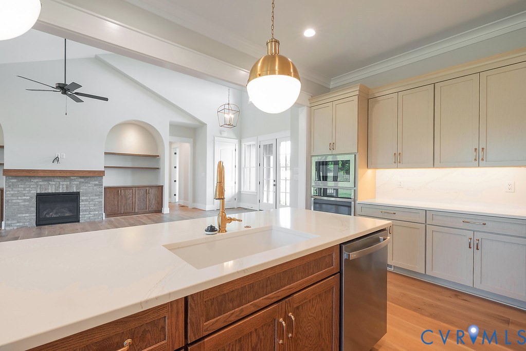 3530 Old Gun Road West Midlothian, VA 23113 - Photo 17 of 50 a kitchen with a sink a stove and a window