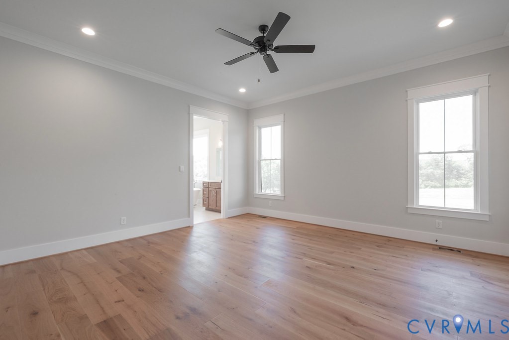 3530 Old Gun Road West Midlothian, VA 23113 - Photo 26 of 50 an empty room with wooden floor and windows