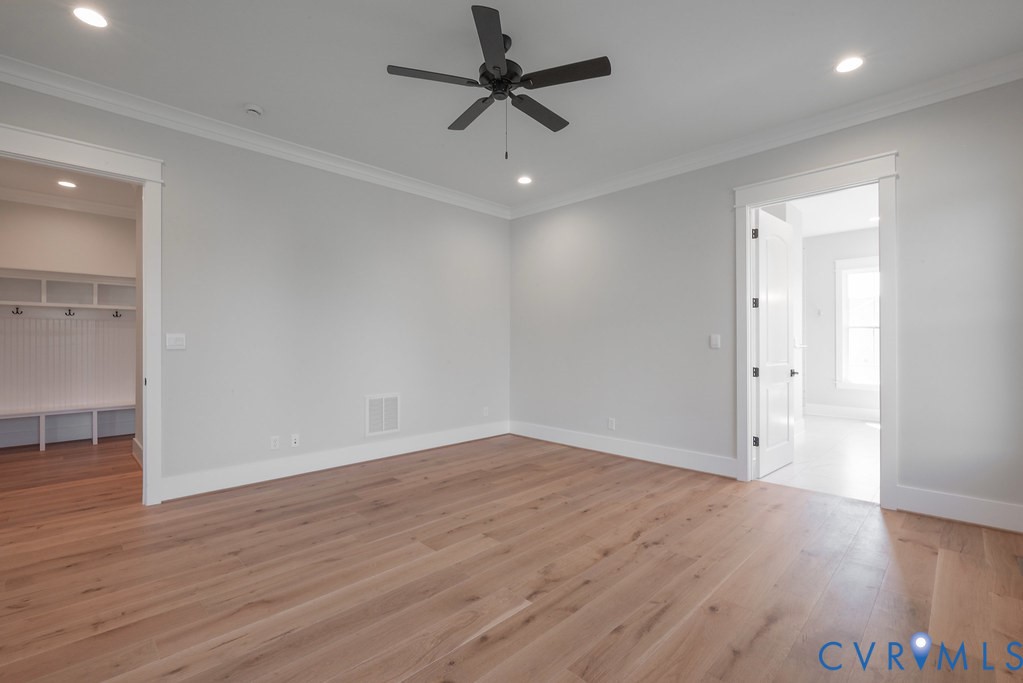 3530 Old Gun Road West Midlothian, VA 23113 - Photo 27 of 50 an empty room with wooden floor and windows