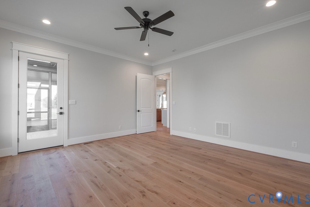 3530 Old Gun Road West Midlothian, VA 23113 - Photo 28 of 50 a view of an empty room with a window and wooden floor