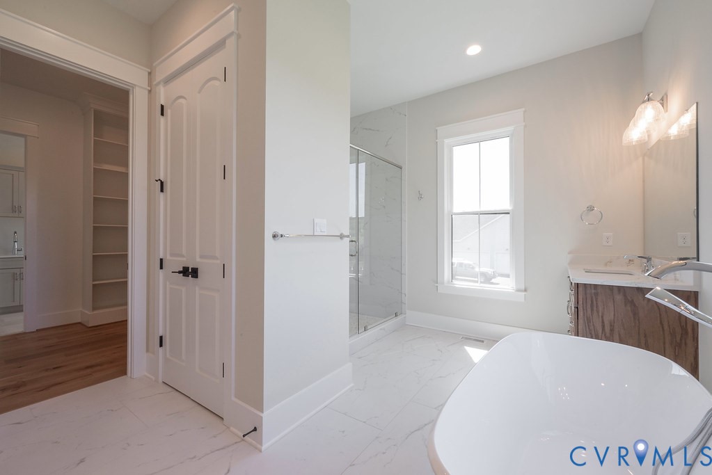 3530 Old Gun Road West Midlothian, VA 23113 - Photo 30 of 50 a spacious bathroom with a bathtub and shower