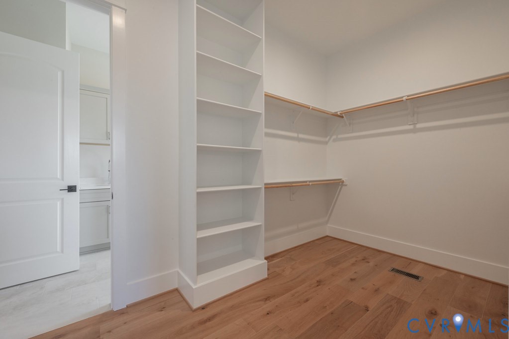 3530 Old Gun Road West Midlothian, VA 23113 - Photo 33 of 50 a view of walk in closet with empty racks