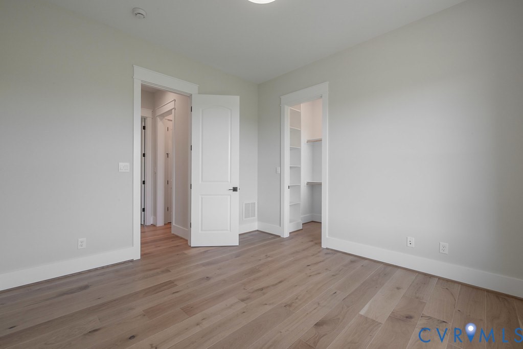 3530 Old Gun Road West Midlothian, VA 23113 - Photo 35 of 50 a view of an empty room and wooden floor