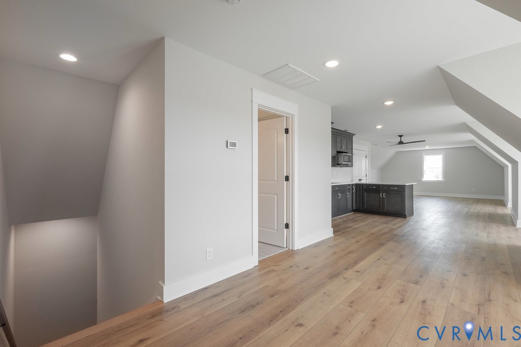 3530 Old Gun Road West Midlothian, VA 23113 - Photo 40 of 50 a view of a hallway with wooden floor