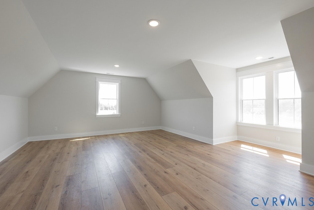 3530 Old Gun Road West Midlothian, VA 23113 - Photo 43 of 50 an empty room with wooden floor and windows