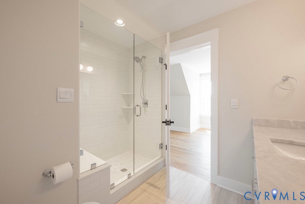 3530 Old Gun Road West Midlothian, VA 23113 - Photo 46 of 50 a bathroom with a shower and a glass door