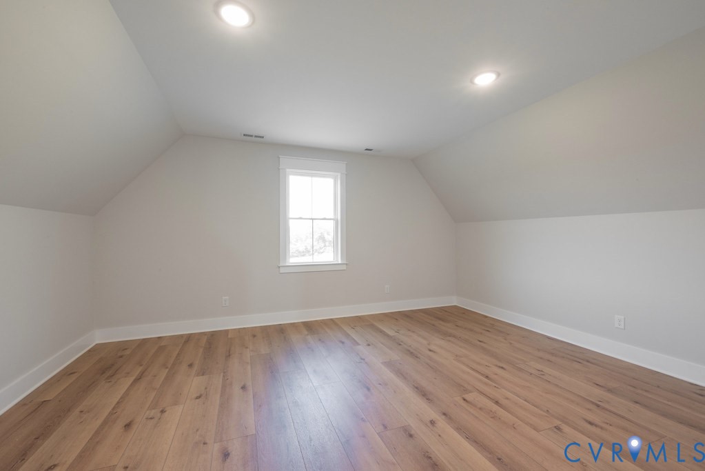 3530 Old Gun Road West Midlothian, VA 23113 - Photo 47 of 50 an empty room with wooden floor and windows