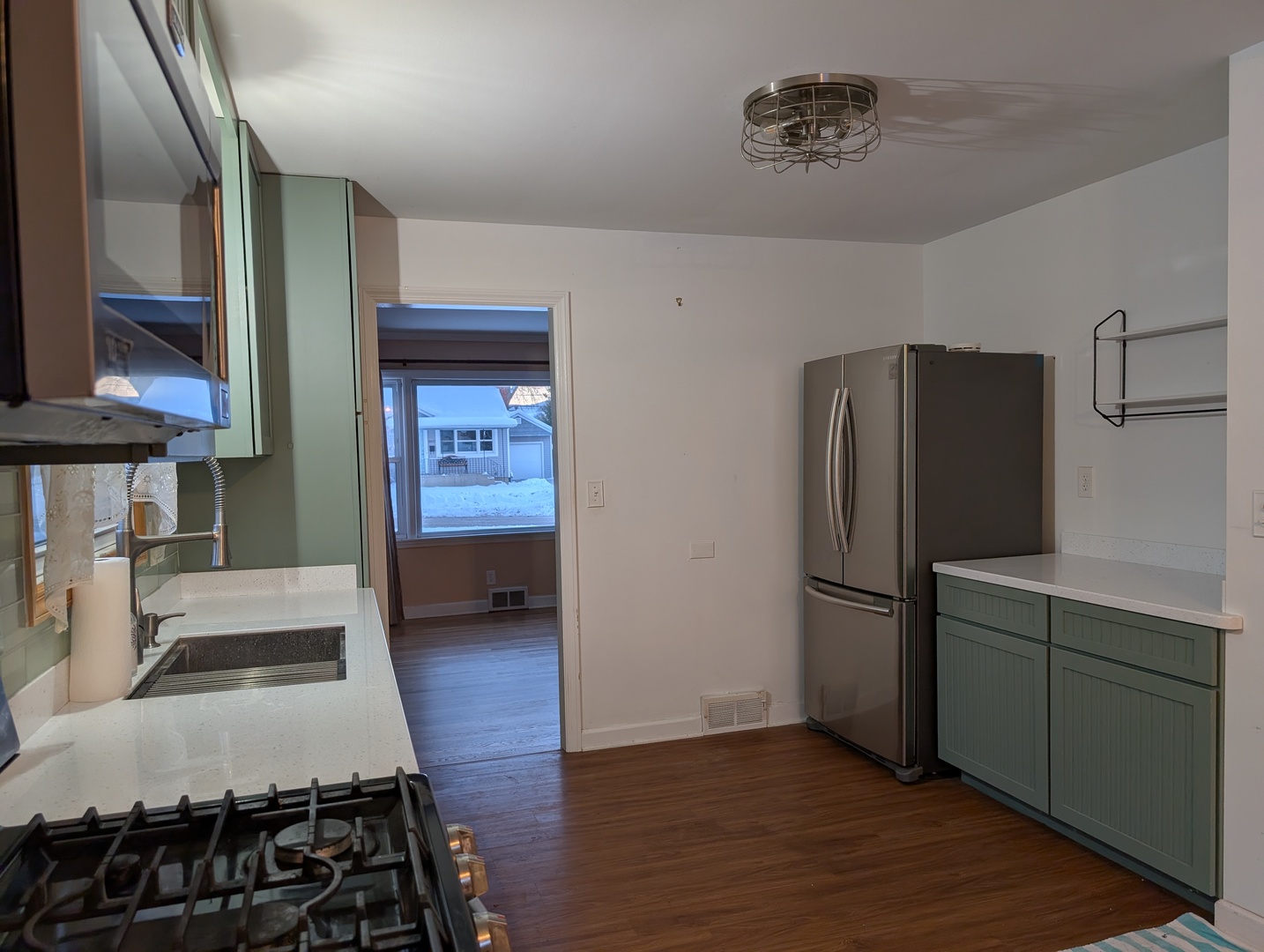 3618 Maple Avenue McHenry, IL 60050 - Photo 9 of 15 a kitchen with stainless steel appliances granite countertop a refrigerator and a stove