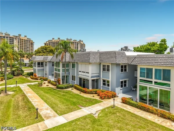 a view of a house with a swimming pool