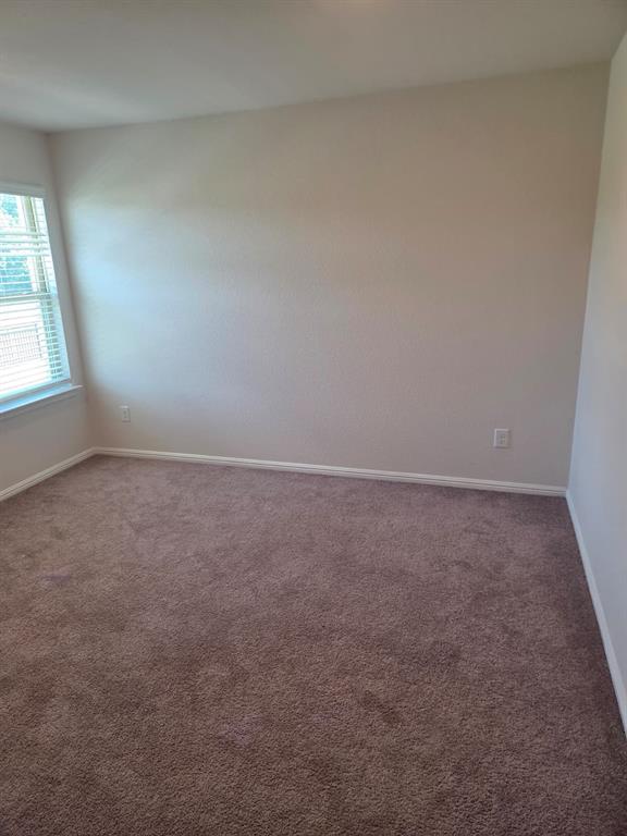 1512 Springtree Drive McKinney, TX 75071 - Photo 15 of 23 an empty room with a window