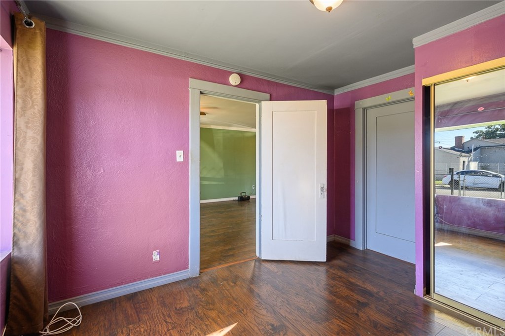 355 West Spruce Street Compton, CA 90220 - Photo 16 of 27 a view of empty room with wooden floor
