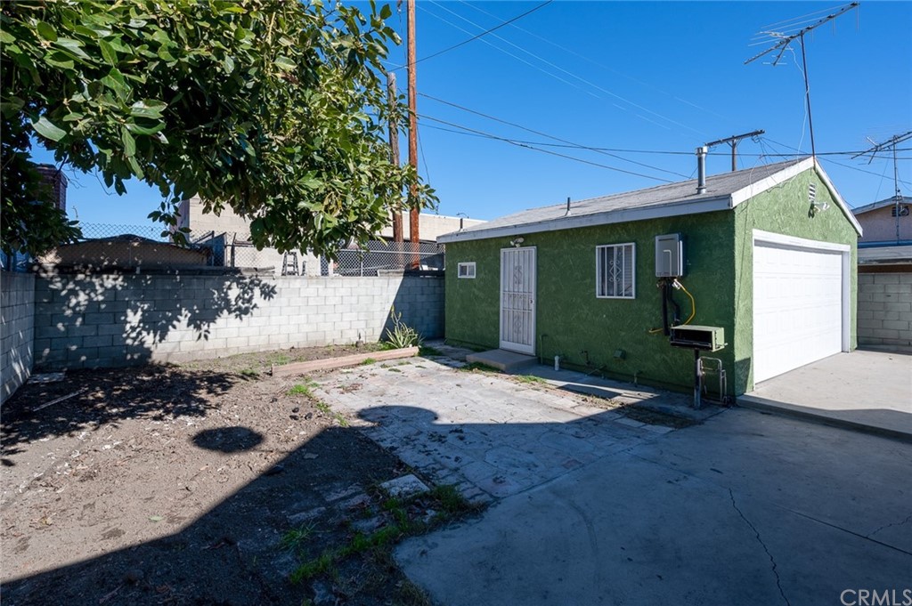 355 West Spruce Street Compton, CA 90220 - Photo 25 of 27 a view of a house with a yard