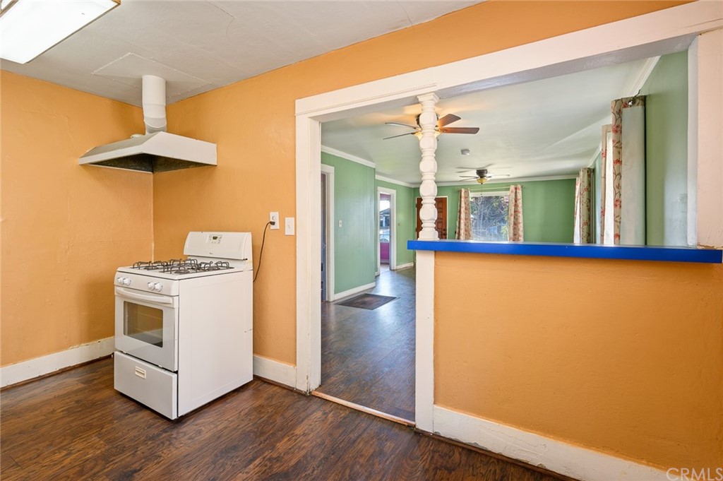 355 West Spruce Street Compton, CA 90220 - Photo 8 of 27 a kitchen view with a stove and a wooden floor