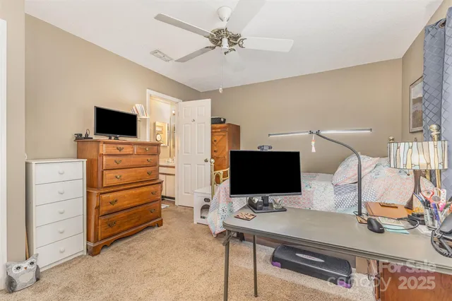 a room with furniture and flat screen tv