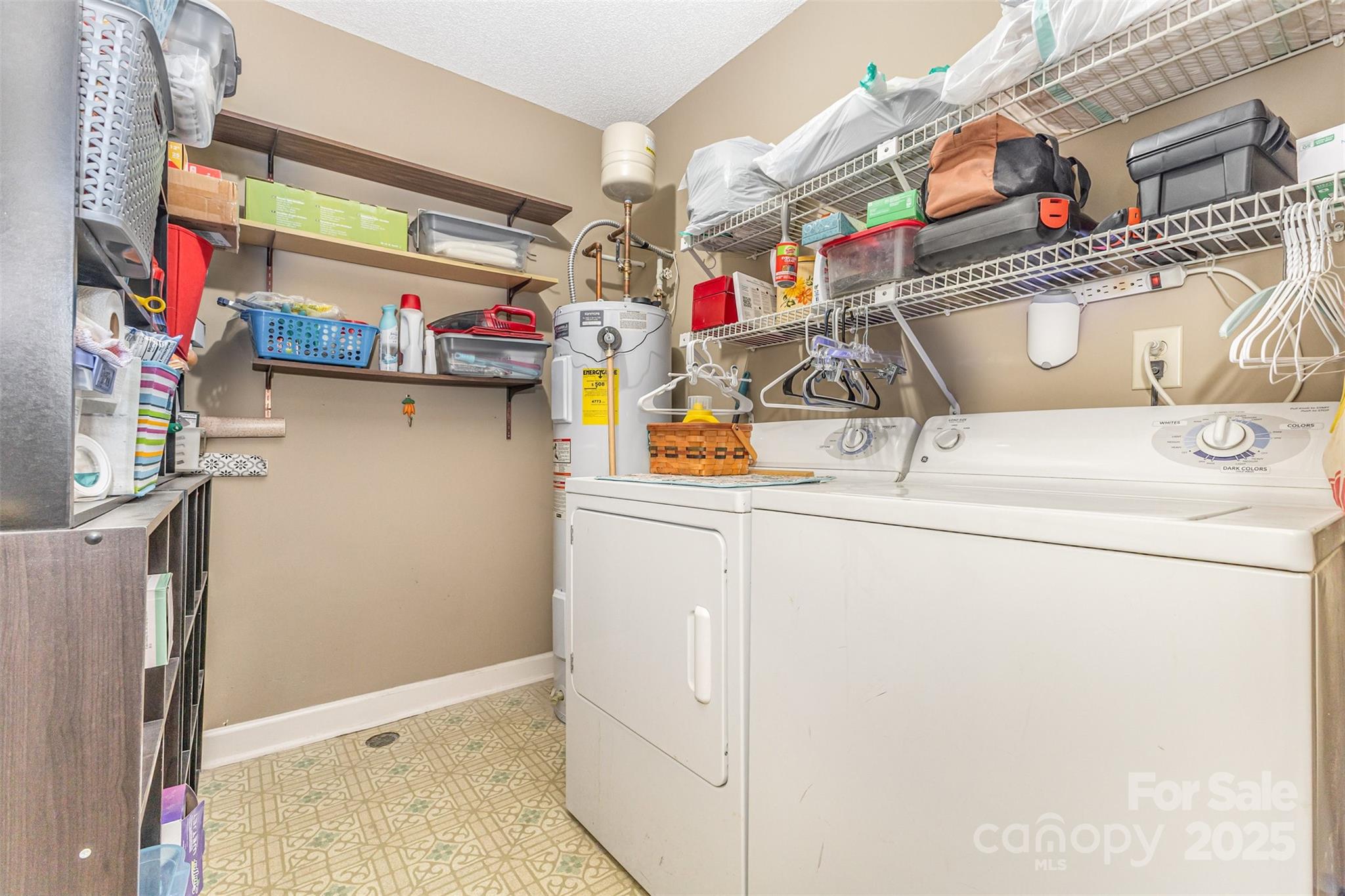 2762 Victory Court, Unit F8 Fort Mill, SC 29715 - Photo 21 of 27 a utility room with dryer and washer