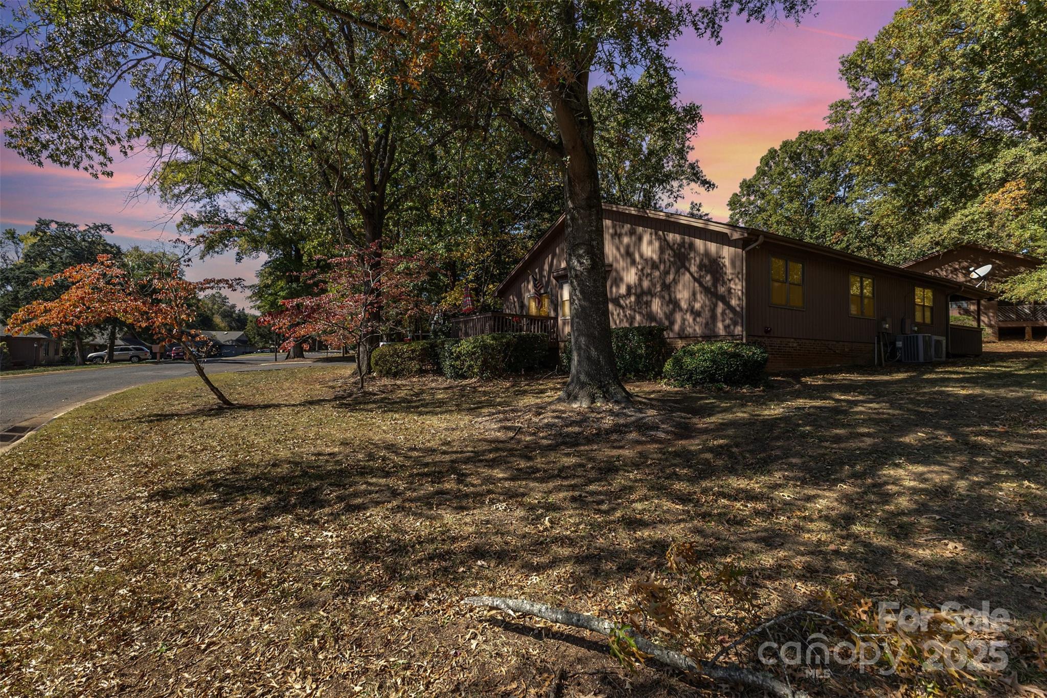 2762 Victory Court, Unit F8 Fort Mill, SC 29715 - Photo 24 of 27 a backyard of a house with lots of green space