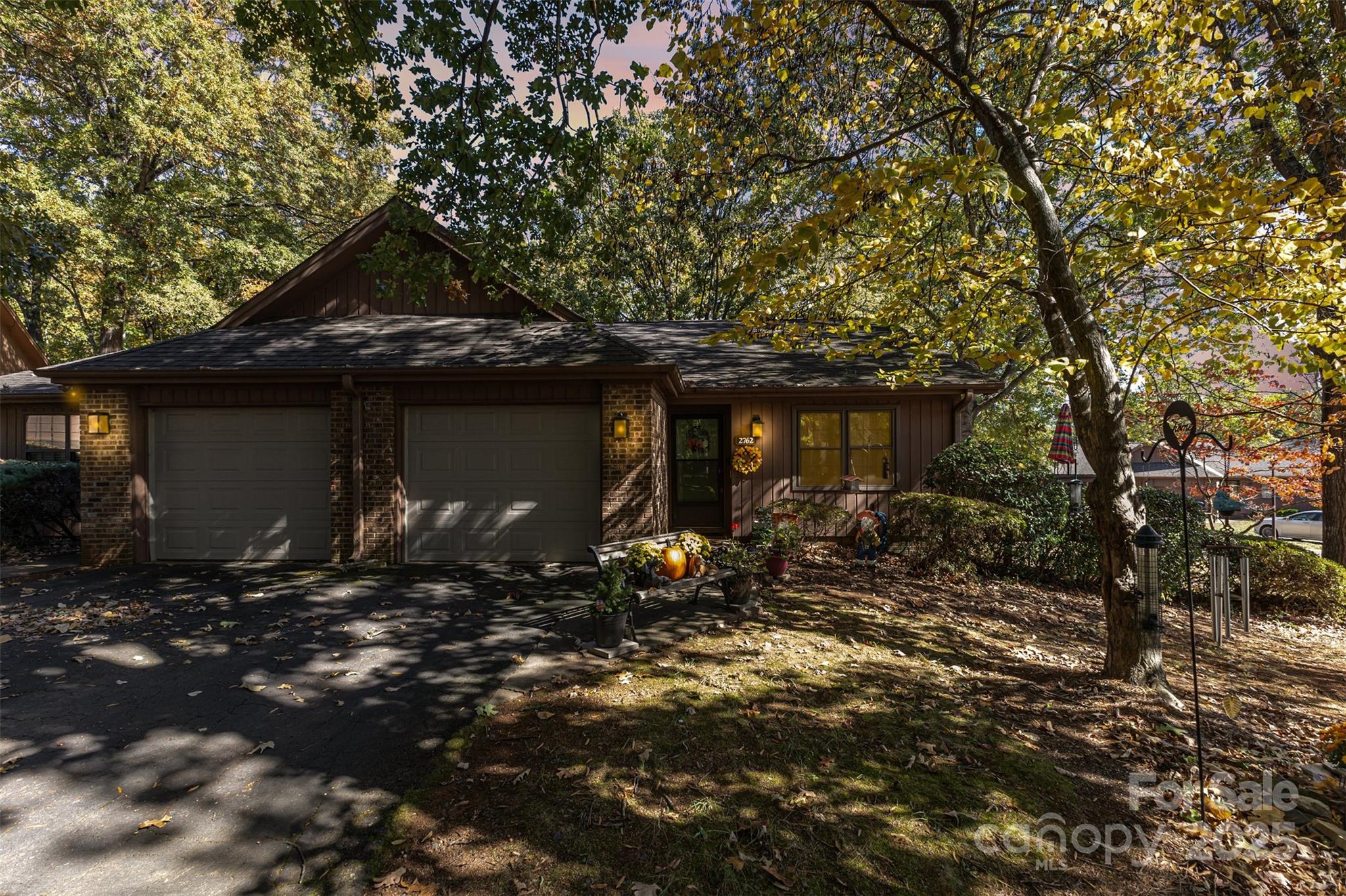 2762 Victory Court, Unit F8 Fort Mill, SC 29715 - Photo 3 of 27 a front view of a house with a yard