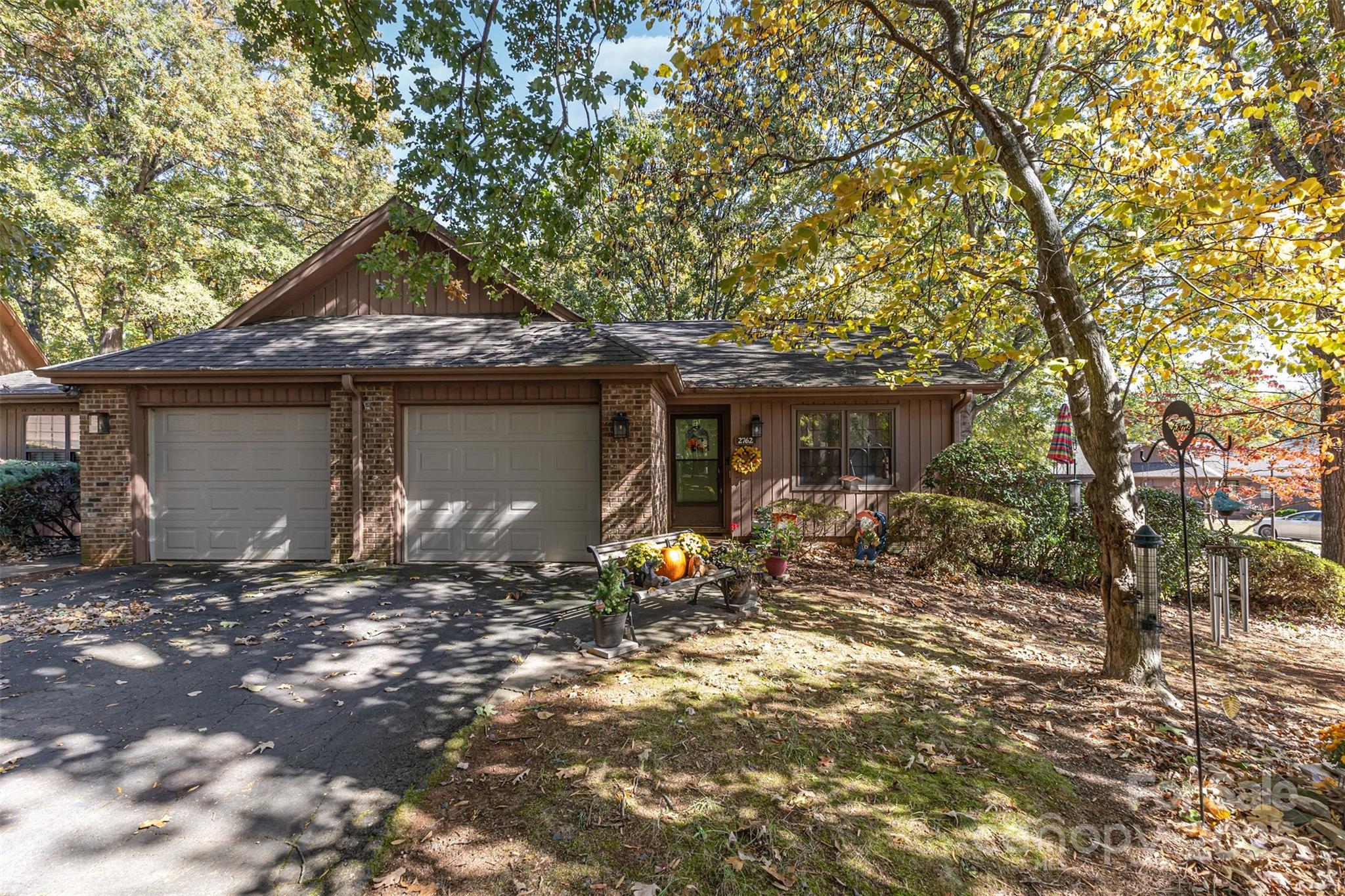 2762 Victory Court, Unit F8 Fort Mill, SC 29715 - Photo 4 of 27 a front view of a house with garden