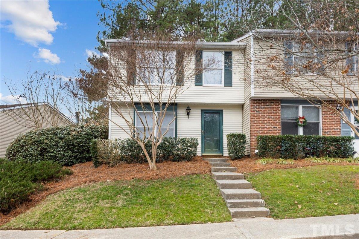 7721 Sandra Lane Raleigh, NC 27615 - Photo 2 of 29 front view of a house with a yard
