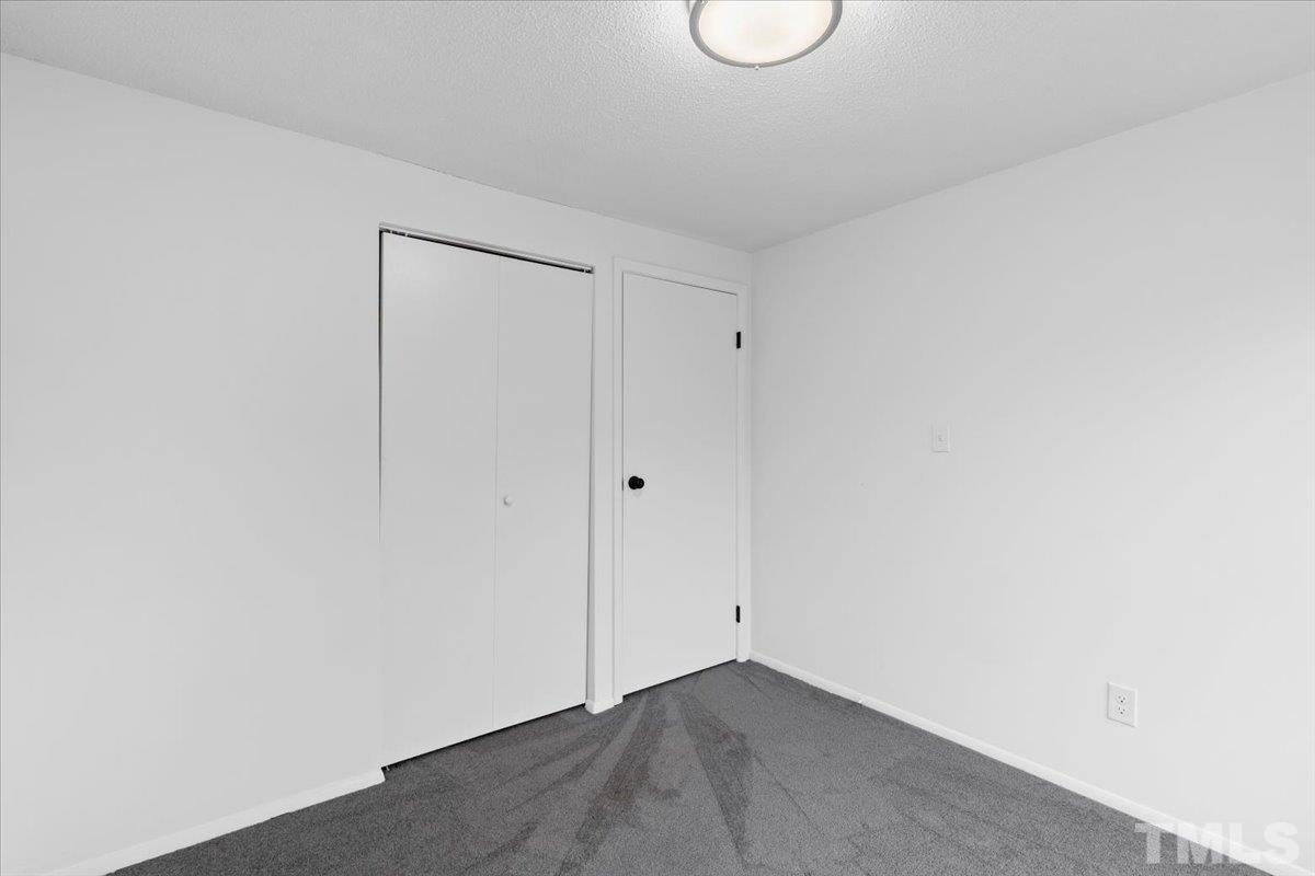 7721 Sandra Lane Raleigh, NC 27615 - Photo 27 of 29 a view of an empty room