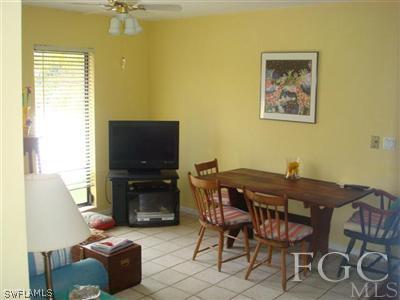 1389 Albatross Road Sanibel, FL 33957 - Photo 6 of 10 a view of a livingroom with furniture and a flat screen tv