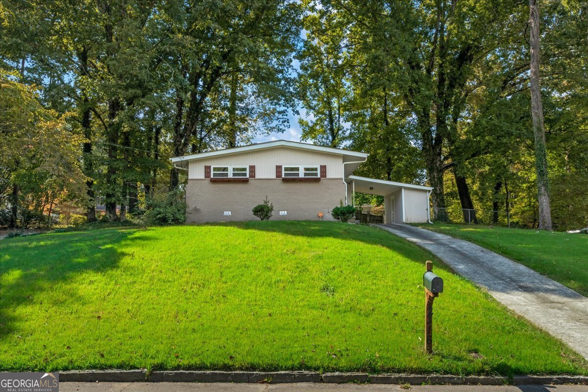 2316 Dorsey Avenue East Point, GA 30344 - Photo 1 of 25 a view of a house with a yard