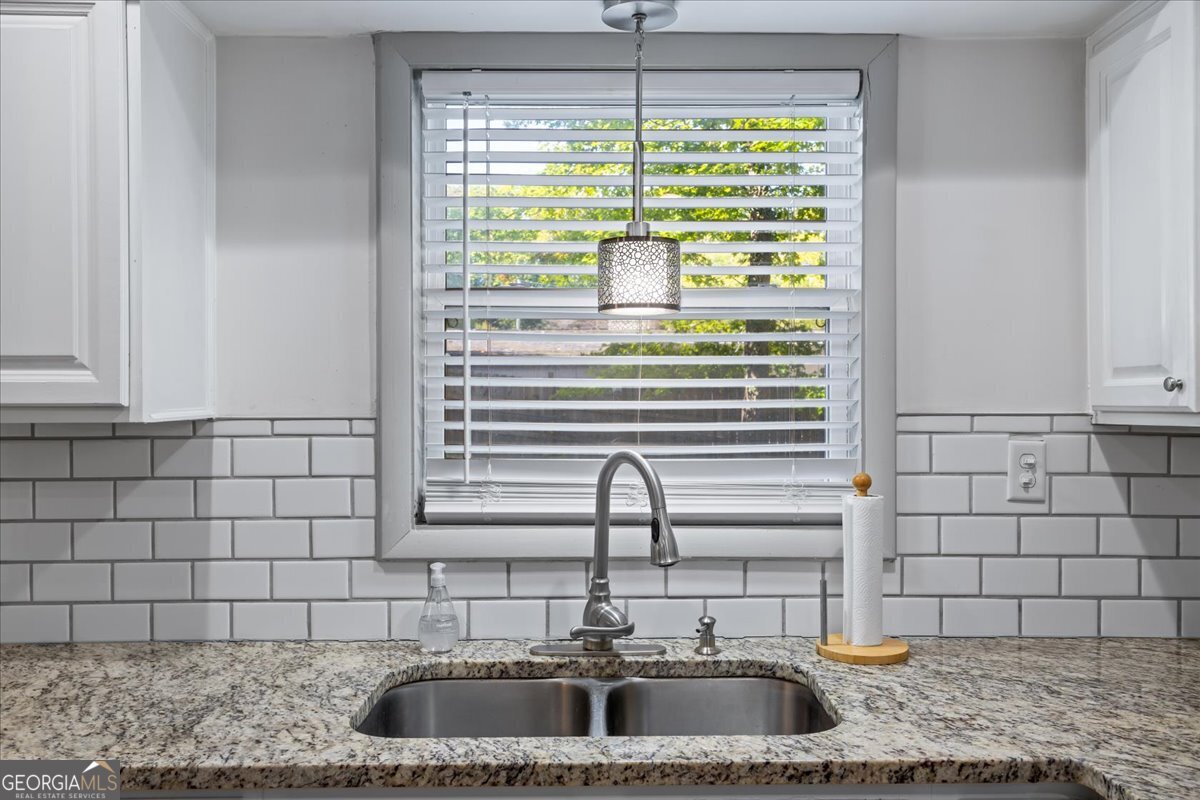 2316 Dorsey Avenue East Point, GA 30344 - Photo 14 of 25 a kitchen with a sink and a window