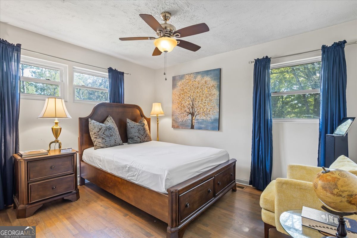2316 Dorsey Avenue East Point, GA 30344 - Photo 19 of 25 a bedroom with a bed and window